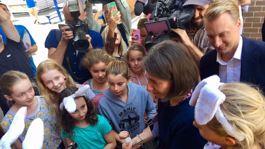 Premier Berejiklian greets some children with James Griffin.