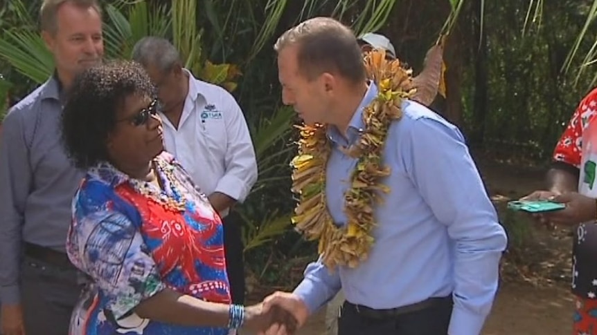 Abbott visits Eddie Mabo's grave on Murray Island