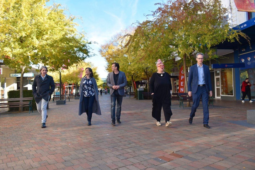 The Ballarat mayor, a group of local retailers, and the designer charged with revamping Bridge Mall pictured walking in the mall