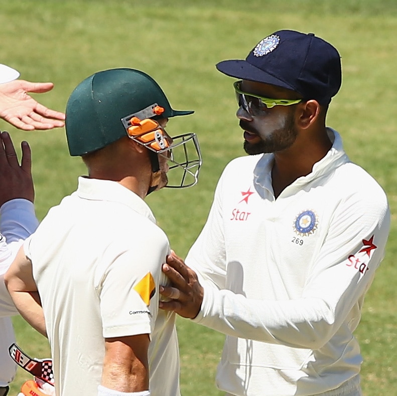 Virat Kohli of India and David Warner of Australia arguing