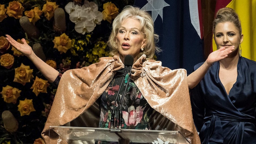 Blanche d'Alpuget raises her hands as she speaks at the memorial service for her husband Bob Hawke.