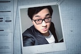 A selfie photograph of Bo "Nick" Zhao. He is wearing glasses, a dark suit jacket and white t-shirt.