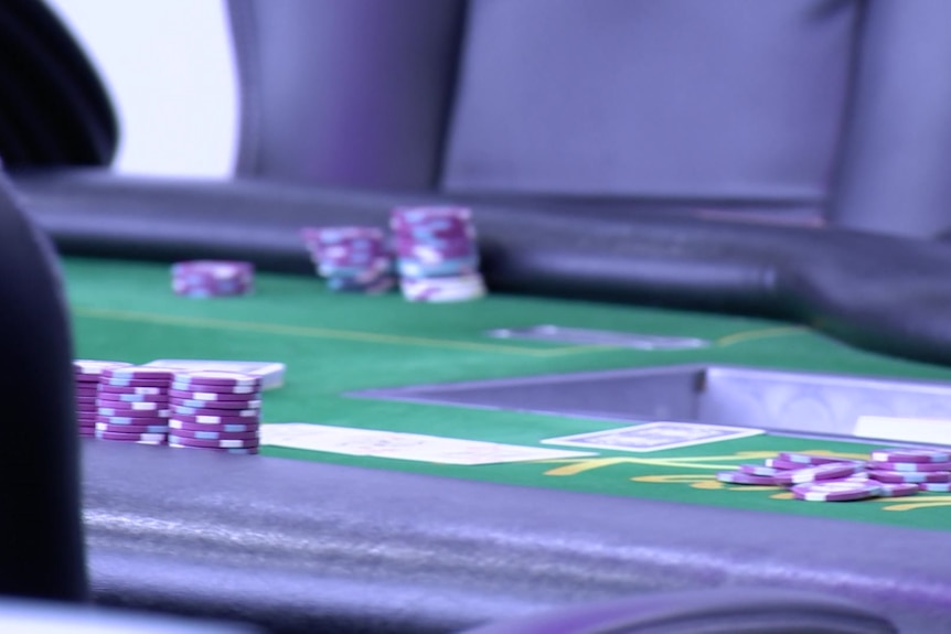 Gambling chips on a table.