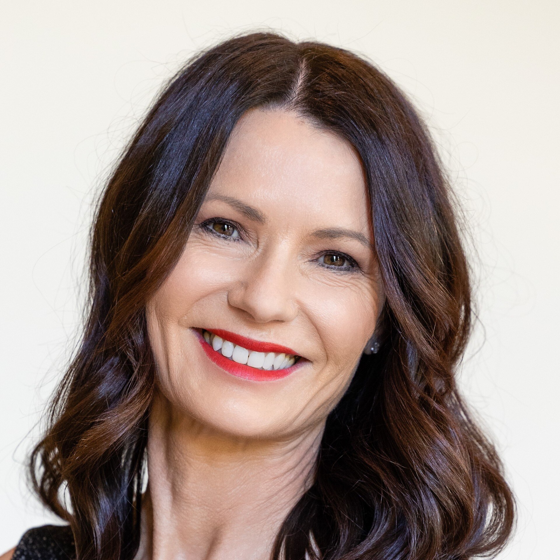 Cath Evans smiles at the camera.