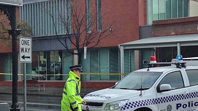 Police have cordoned off the Youth Court building in Adelaide after small homemade explosive devices were found.