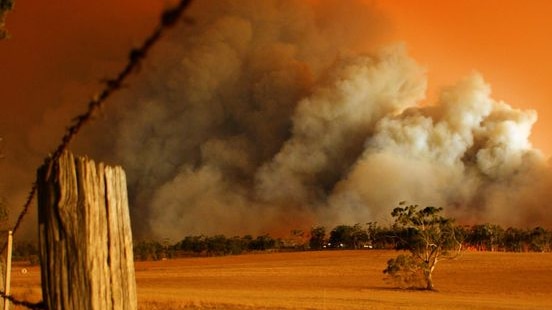 Smoke billows from the Churchill bushfire in the Gippsland region of Victoria