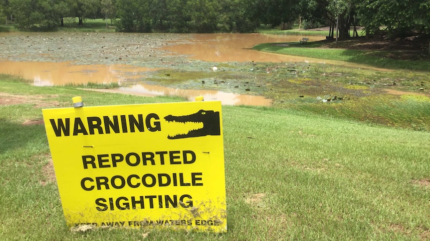 A crocodile warning sign at a park in Durack, near Palmerston, where a dog was dragged into the water by a crocodile.