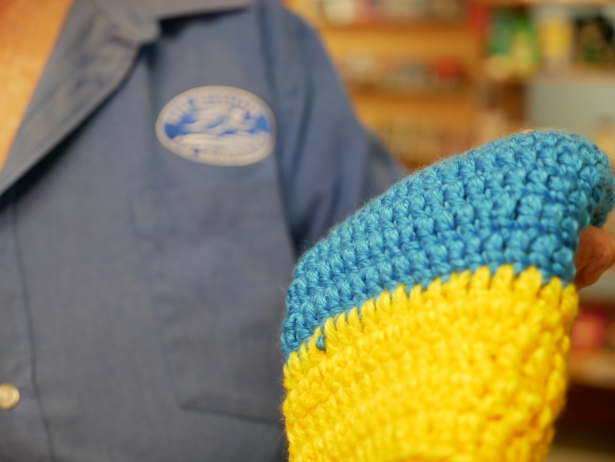 A yellow and blue woolen beanie.