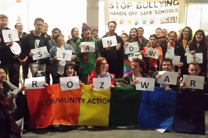 People rally at La Trobe University's Sydney campus