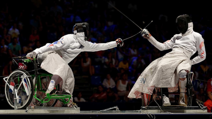 Wheelchair fencers in action