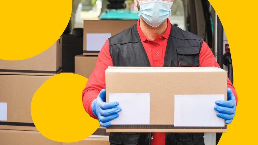 A man delivering parcels, wearing a disposable mask and gloves.