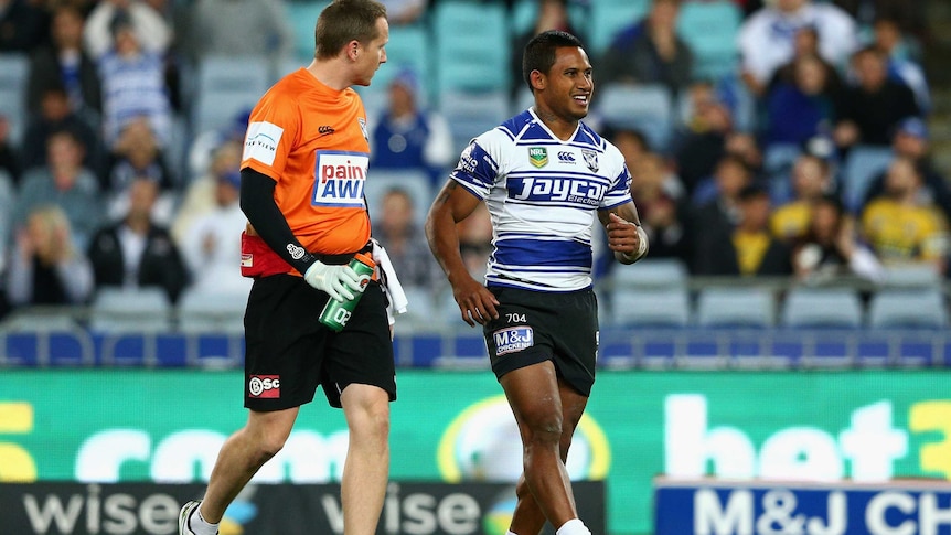 Injury concern ... Ben Barba leaves the field with an injured ankle