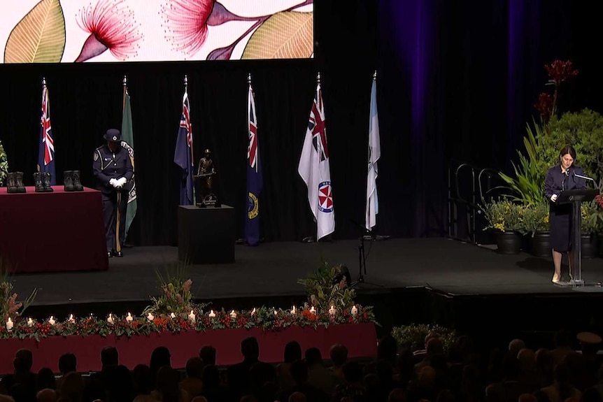 Six pairs of boots lined a table as Ms Berejiklian spoke, signifying the six firefighters who were killed.