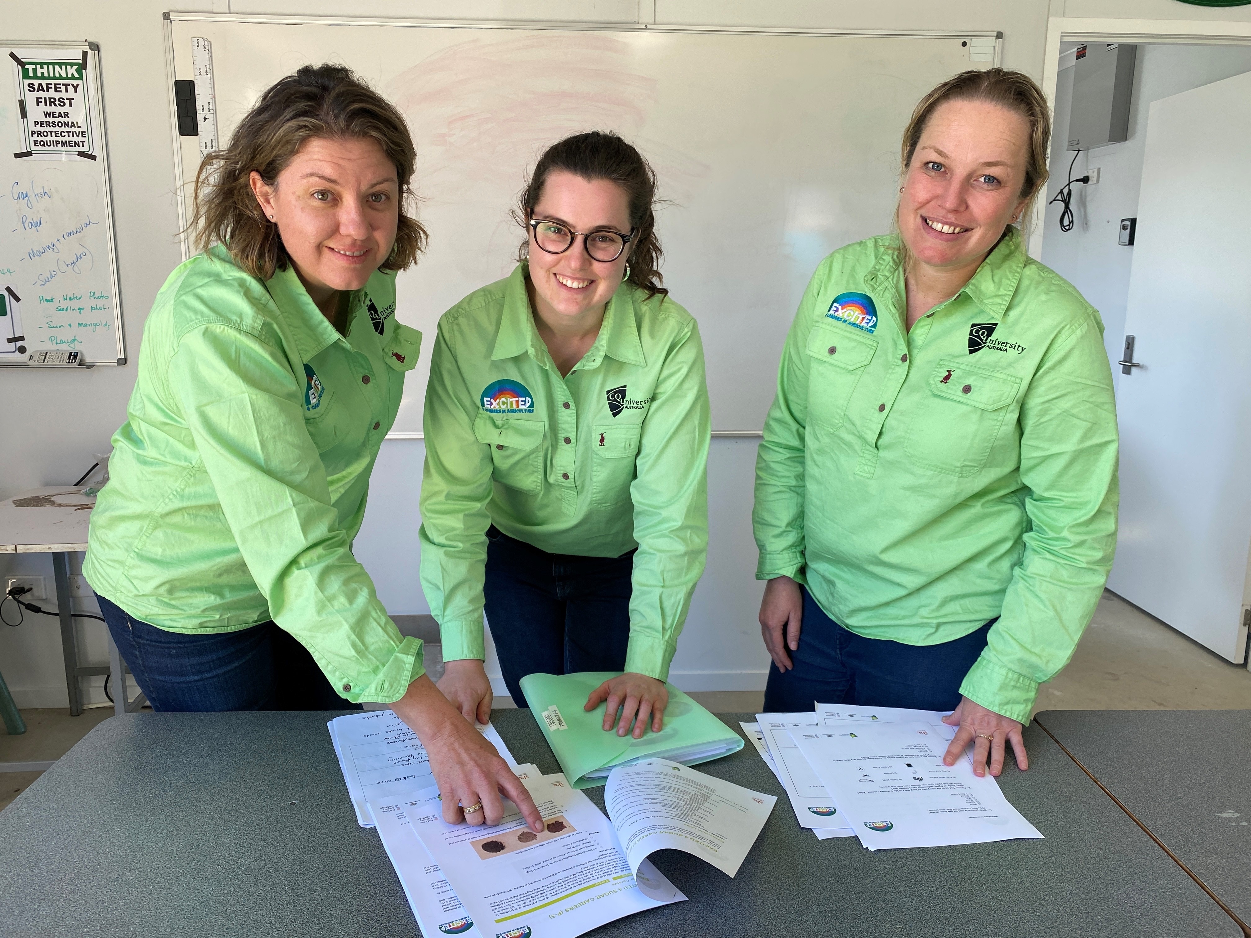 CQ University research officers Nikki Kelly, Molly O'Dea and Anna Day review surveys filled in by students from the program