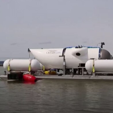 Submersible vessel floating on water. 