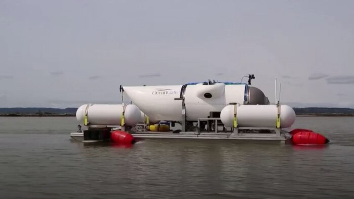 Submersible vessel floating on water. 