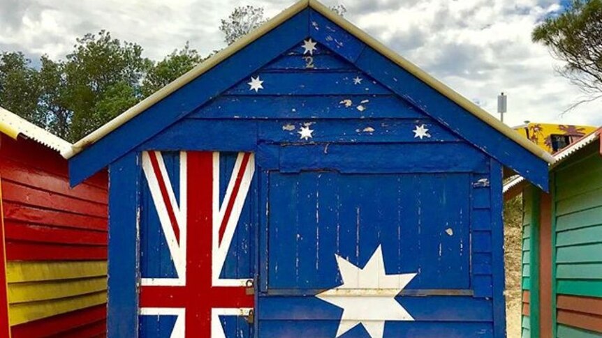 A bathing box with the Australian flag painted on it, at Brighton Beach, Melbourne.