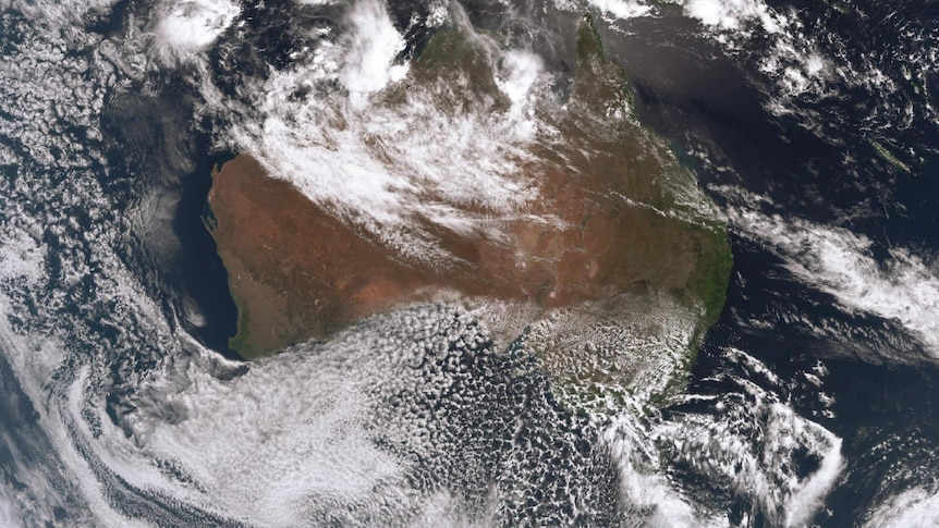 Satellite image of Aus. Deep clouds over N WA. Speckled clouds over south east. 