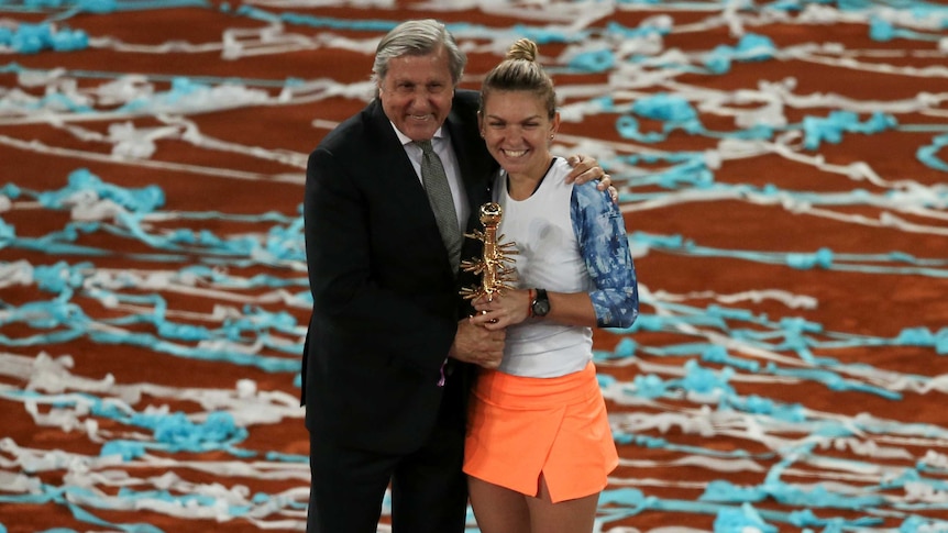 Ilie Nastase with Simona Halep after the Madrid Open