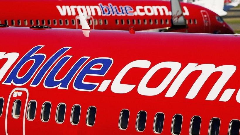 Virgin Blue aircraft wait at Mascot airport