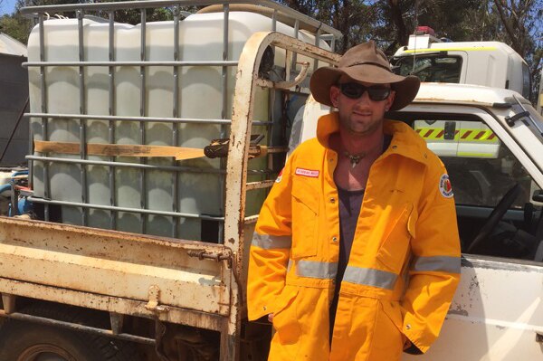Tom Butcher, who died in the Esperance bushfires, pictured leaning against a ute.
