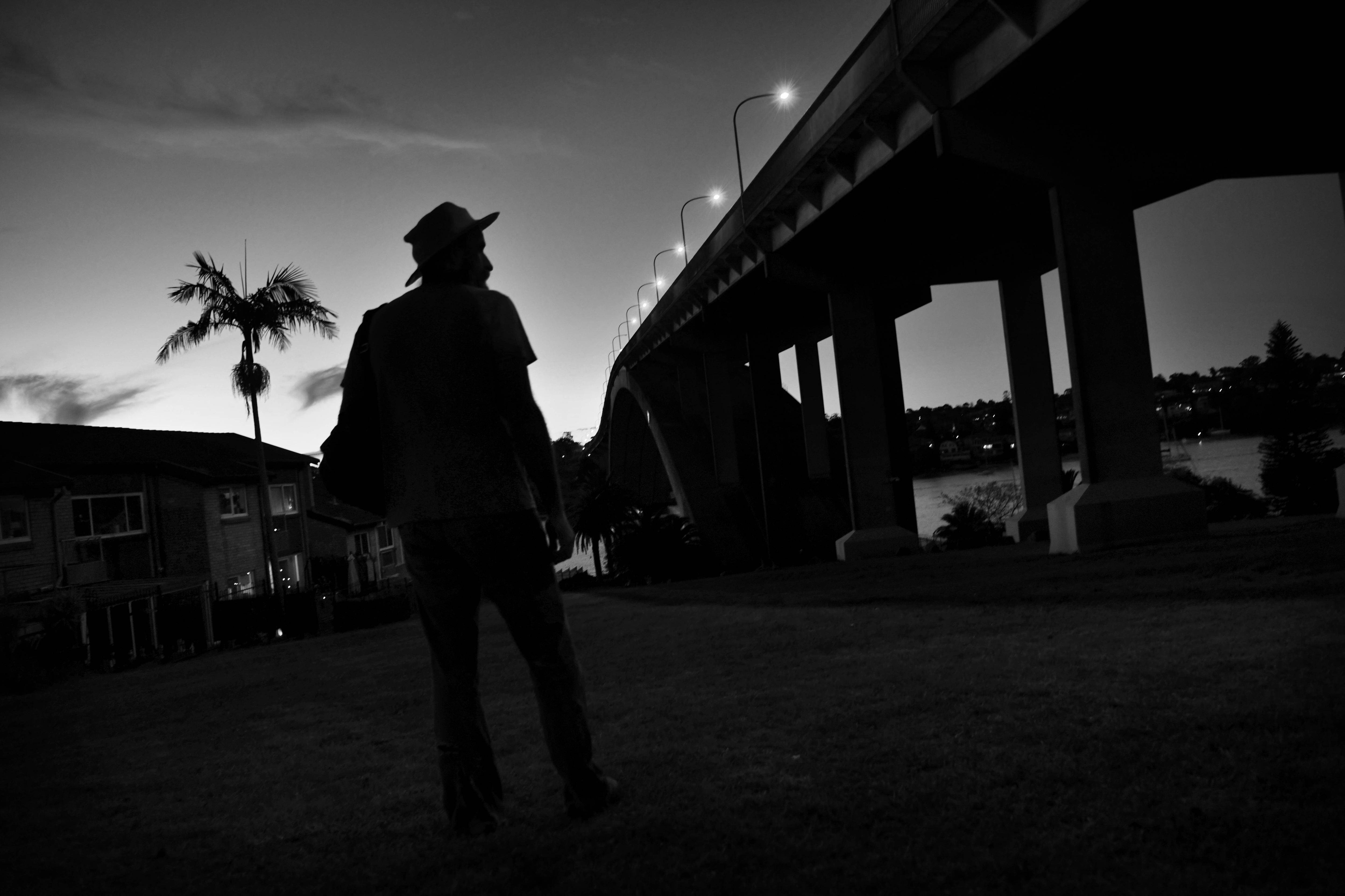 A silhouette of a man at night