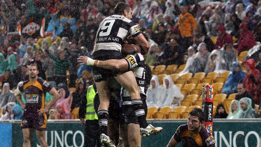 Tigers celebrate win over Broncos