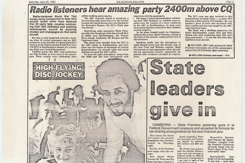 Newspaper clipping with headline 'radio listeners hear amazing party 2400m above CQ'.