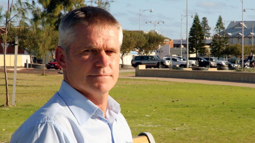 Head shot of Ian Blayney standing outside.