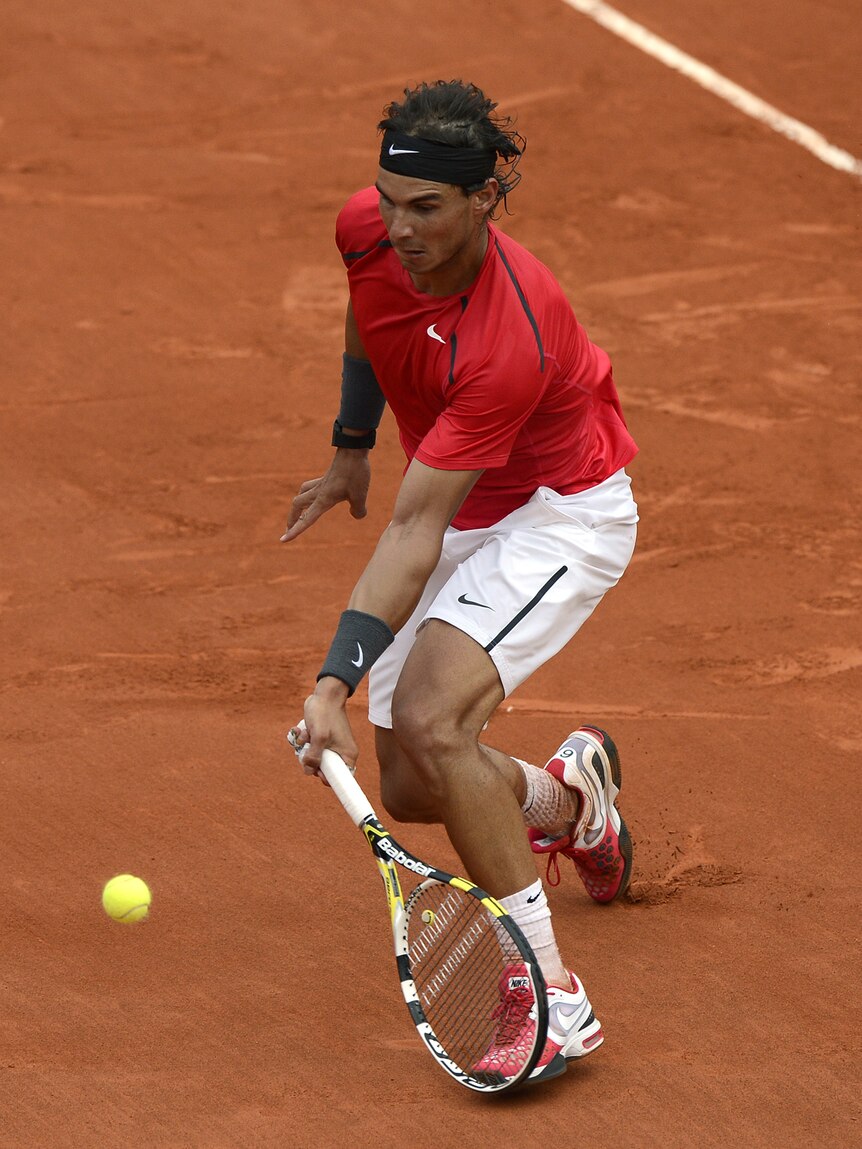Nadal plays a volley