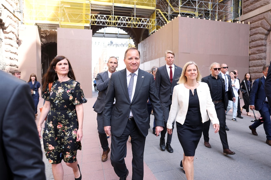 Sweden's PM, housing and finance ministers arrive to Parliament for the no-confidence motion in Stockholm.