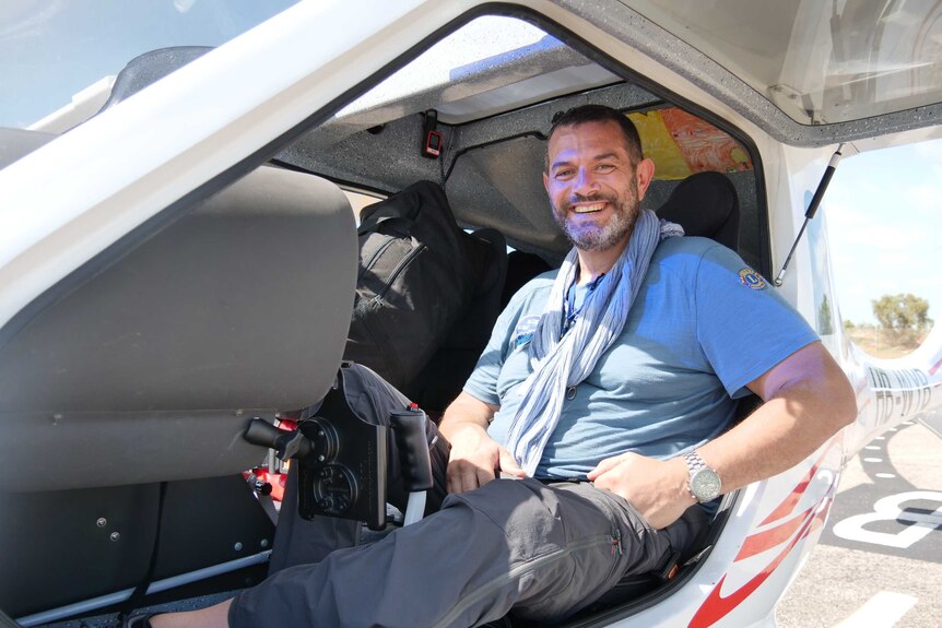 Handiflight pilot Paolo Pocobelli controls his specially designed aircraft with his hands.