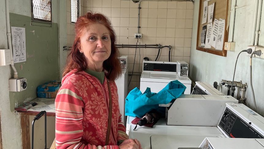 Woman in a laundry.