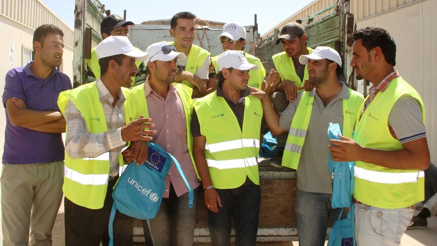 Syrian volunteers work in the Za'atari refugee camp in northern Jordan.