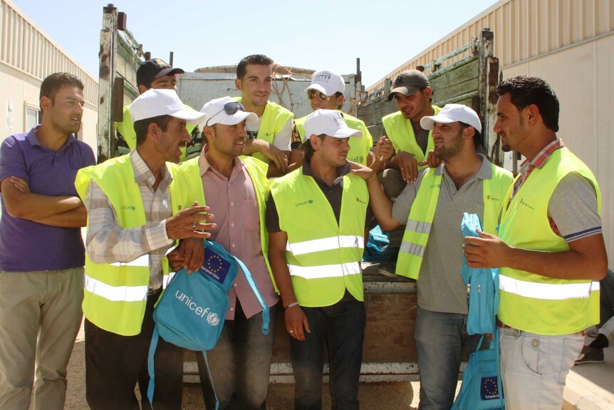 Syrian volunteers work in the Za'atari refugee camp in northern Jordan.