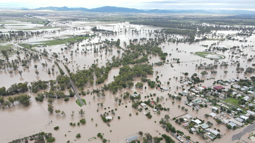 Flooded plains and houses.