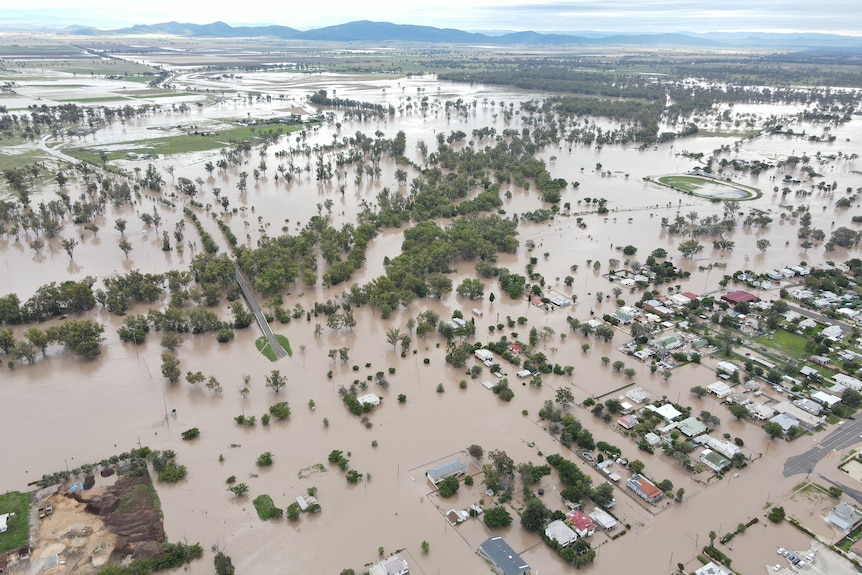 Flooded plains and houses.