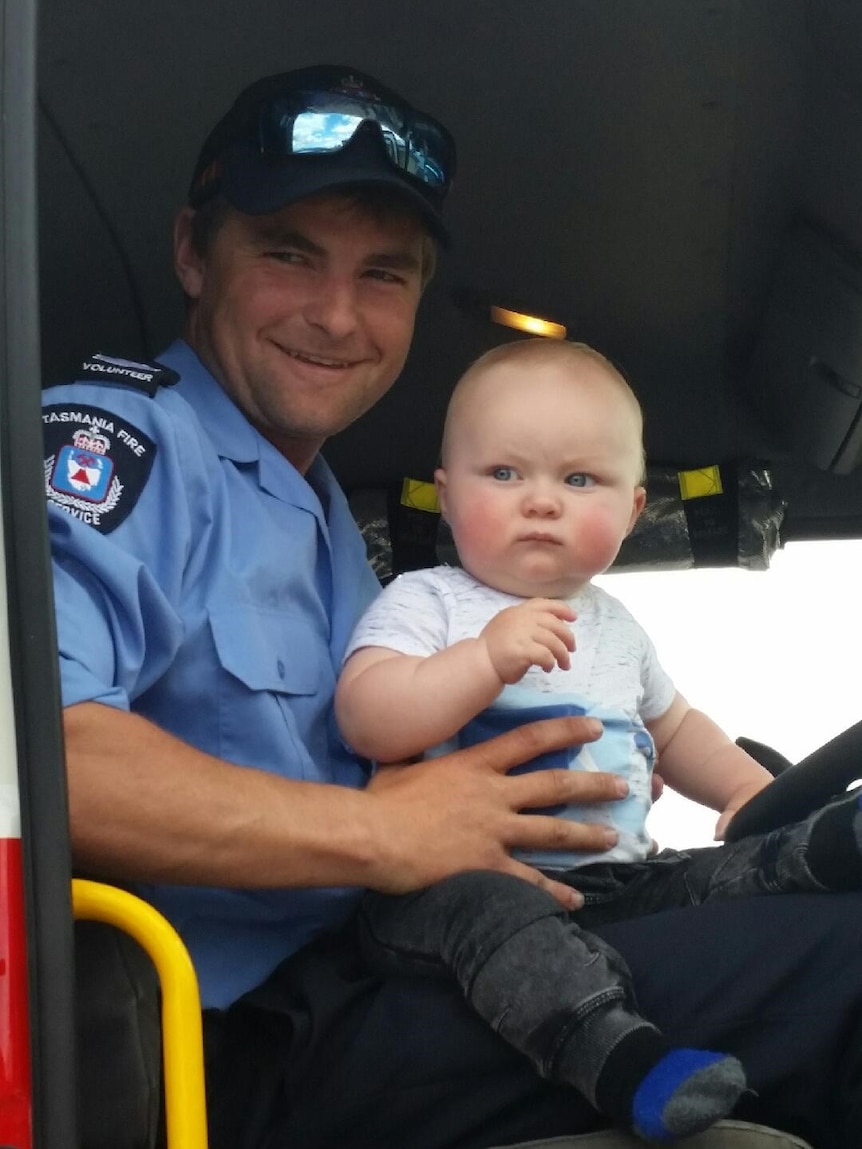 Firefighter Tom Andrews with his son Jack