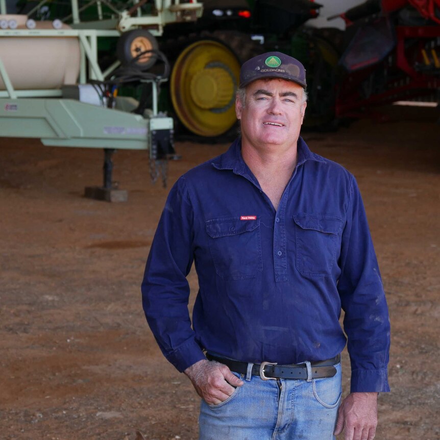 Man in farm shed