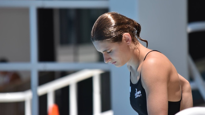 Maddison Keeney looks sad at diving training