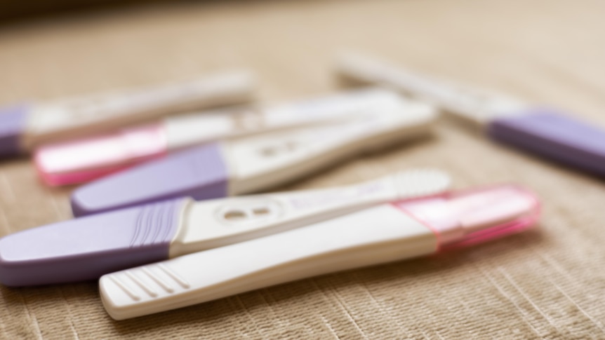 Several pregnancy tests on a table 