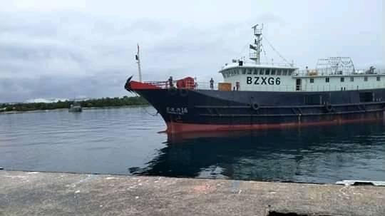 A ship in the water, with the 'BZXG6' written on the side.