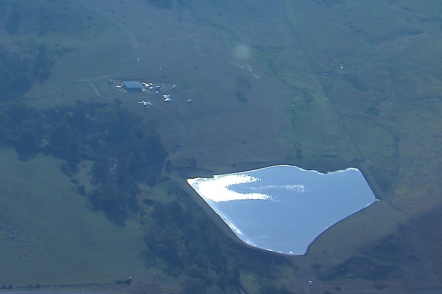 A birds-eye view of the property and dam where the chopper crashed