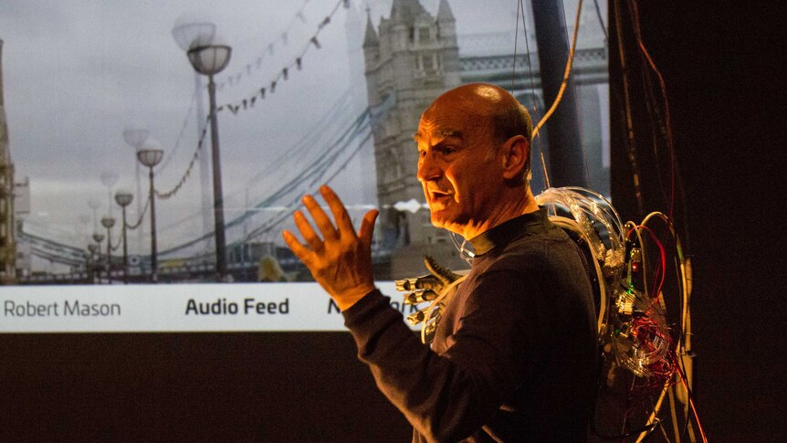 Sight, sound and arm movement are all remotely controlled in Stelarc's project.