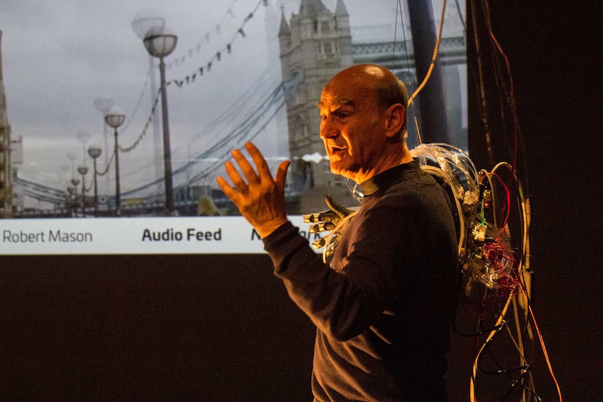 Sight, sound and arm movement are all remotely controlled in Stelarc's project.