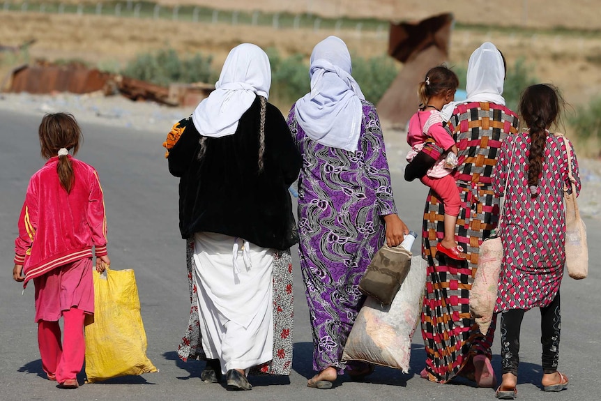 Women and children from the minority Yazidi sect