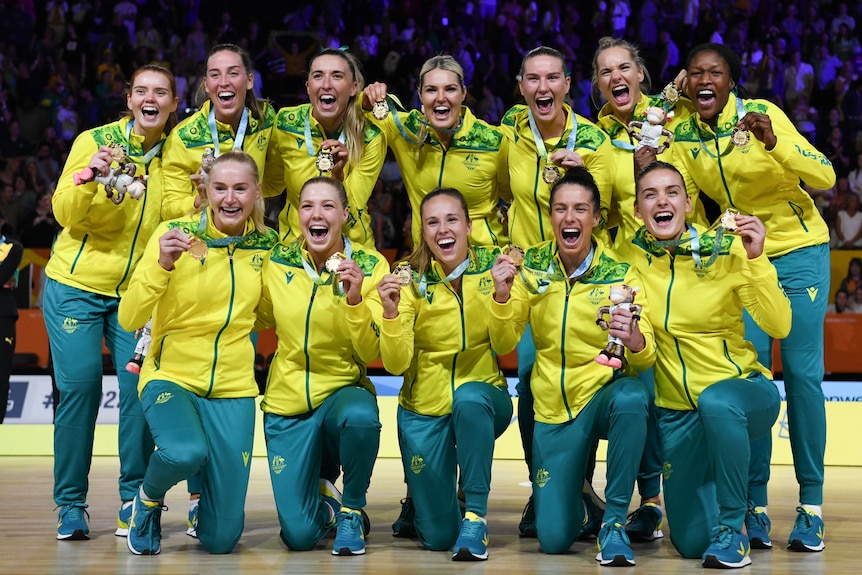 Australian netball team the Diamonds with their Birmingham Commonwealth Games gold medals.