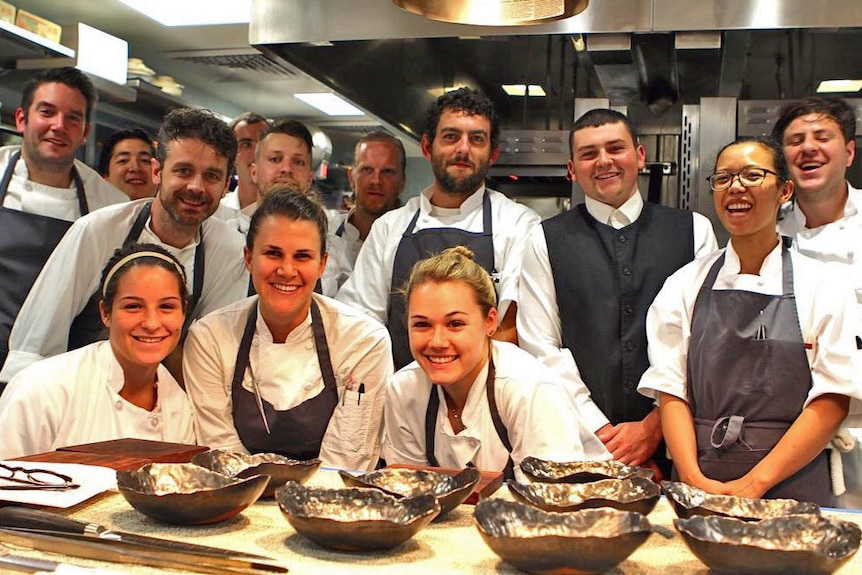 Chef Jock Zonfrillo third from left at top with the team at Manresa restaurant in California