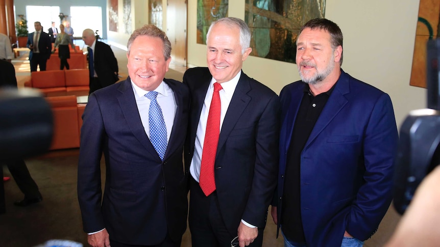 Andrew Forrest, Malcolm Turnbull and Russell Crowe (L-R) stand together for the cameras after a public presser