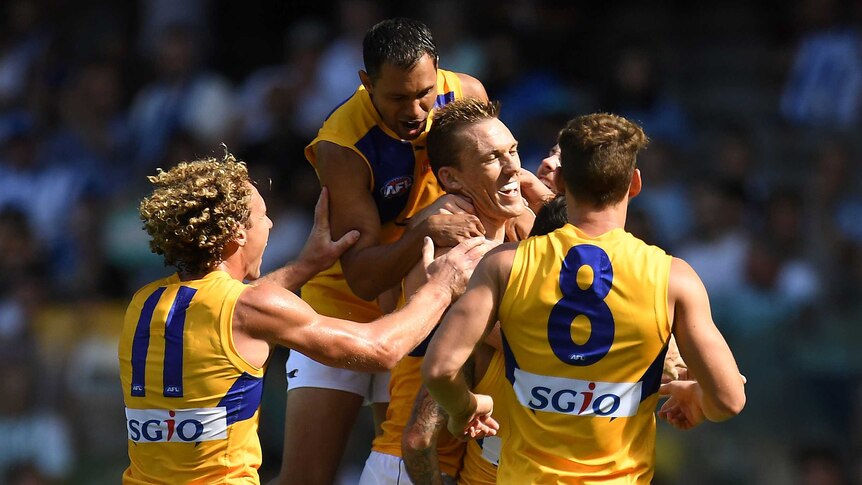 West Coast gets around Drew Petrie after his first goal